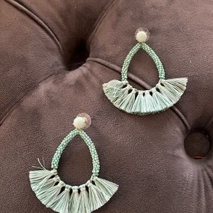 Pretty mint green, light turquoise color. Like new